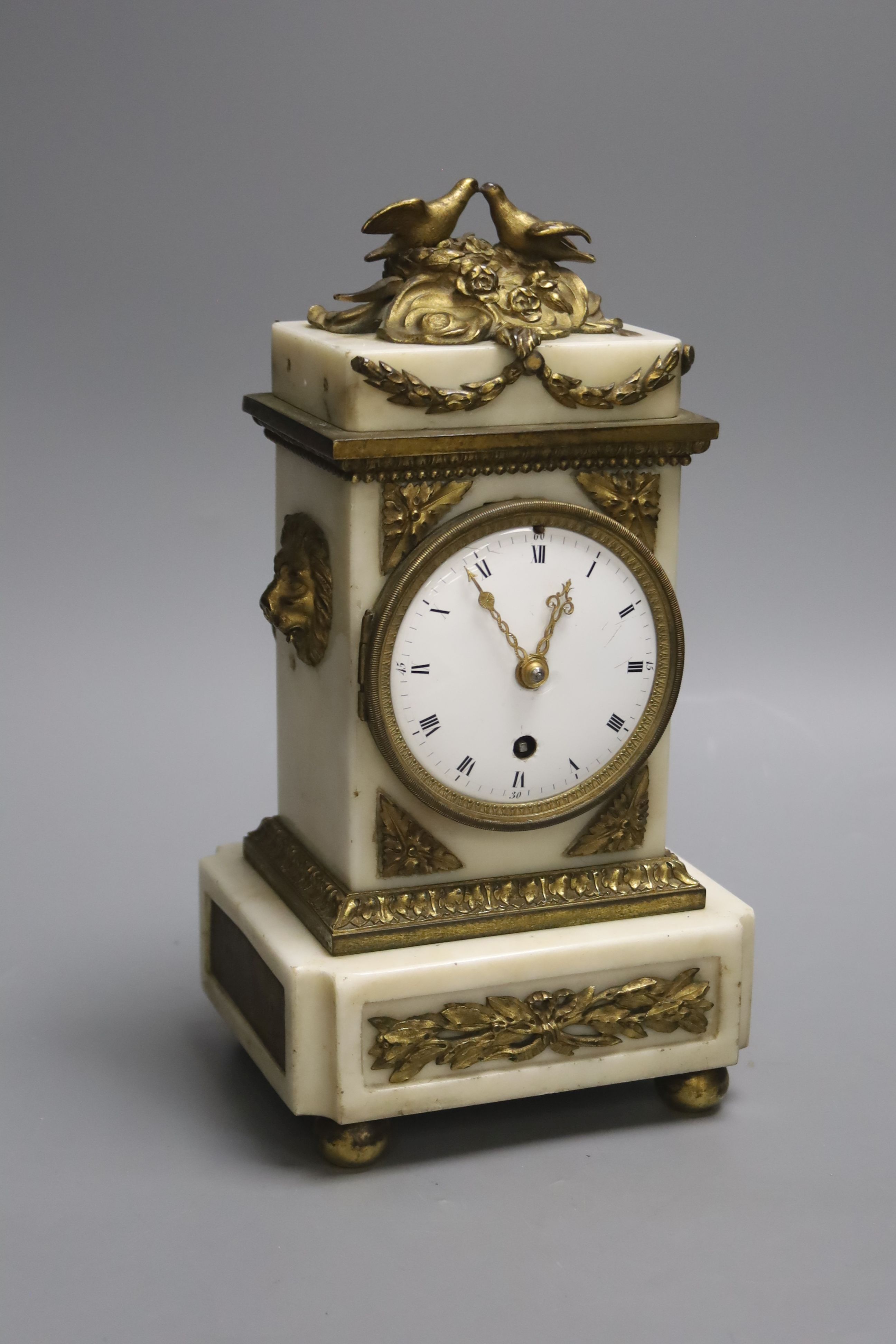 A 19th century bronze and alabaster mantel timepiece, height 28cm